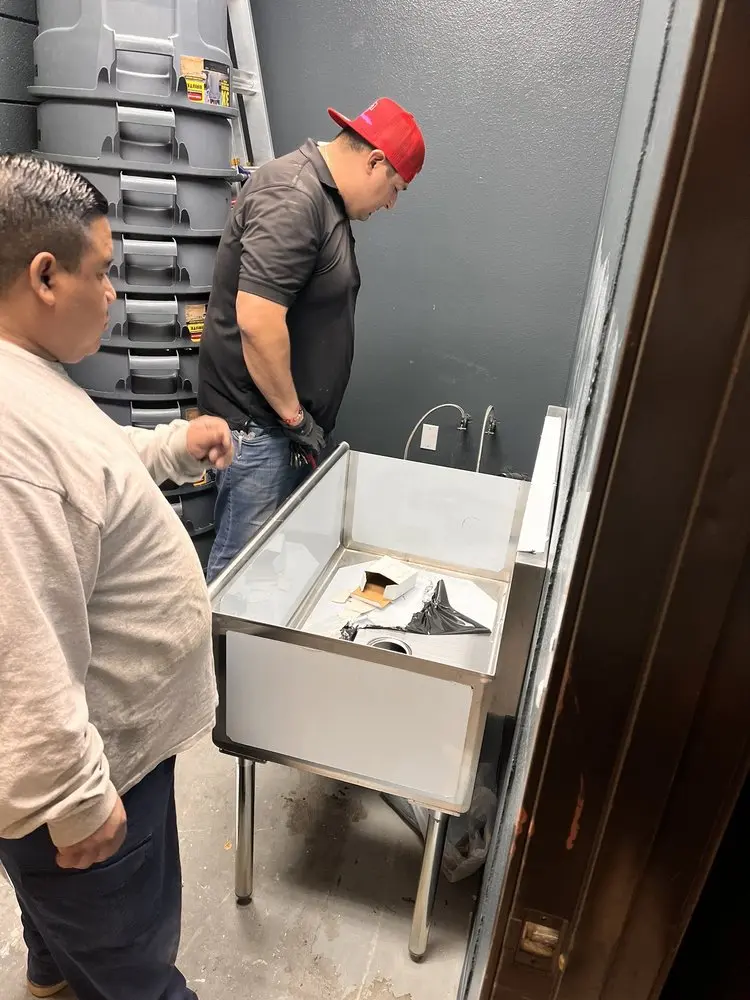 Commercial plumbing and sink installation in Baker